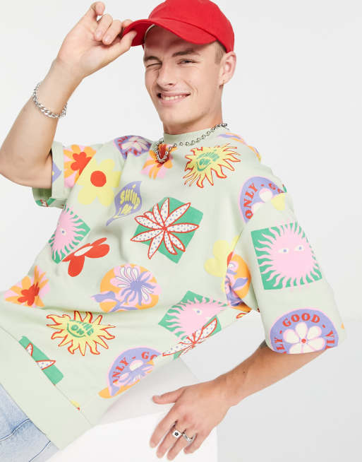 ASOS DESIGN - Felpa oversize a maniche corte verde con stampa in coordinato