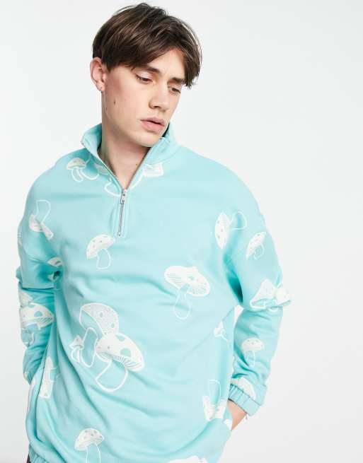 ASOS DESIGN - Felpa oversize blu con stampa di funghi e zip corta in coordinato