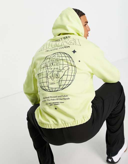 ASOS DESIGN - Felpa oversize con cappuccio e stampa mistica sul retro color giallo pastello