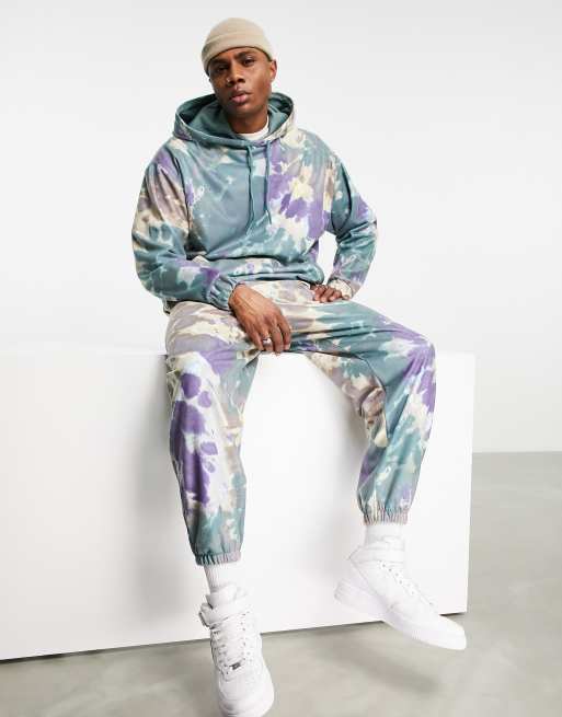 ASOS DESIGN - Felpa oversize con cappuccio in pile tie-dye in coordinato