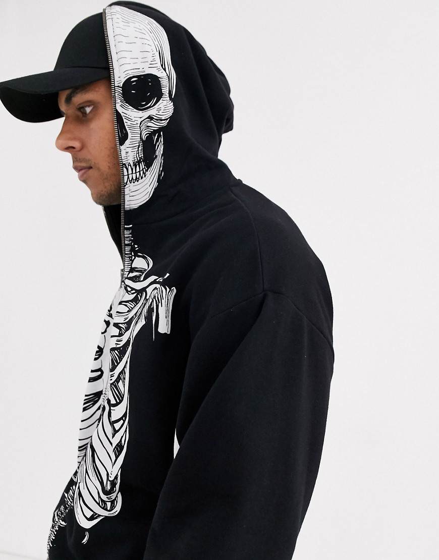 ASOS DESIGN - Felpa oversize con cappuccio nera con stampa con scheletro per Halloween in coordinato-Nero