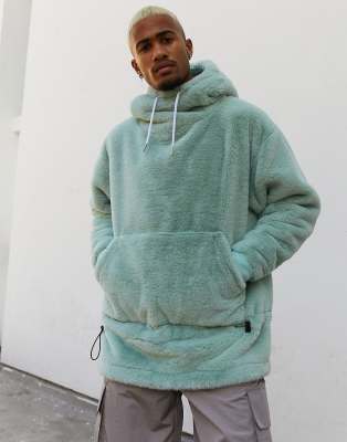 ASOS DESIGN - Felpa oversize in ecopelliccia blu grigio con cappuccio, collo a imbuto e dettagli bungee