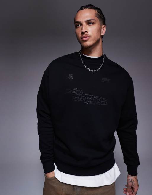 ASOS DESIGN - Felpa oversize nera con stampe metallizzate