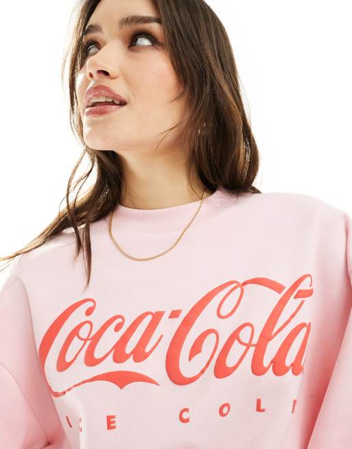 ASOS DESIGN Felpa oversize rosa con grafica Coca Cola su licenza