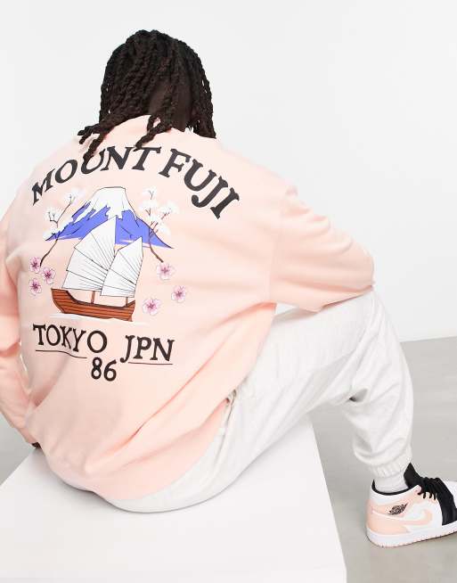 ASOS DESIGN - Felpa oversize rosa con stampa 