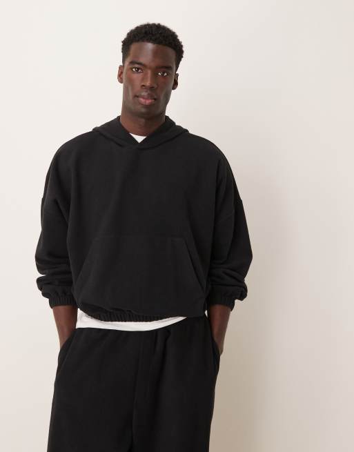 ASOS DESIGN - Felpa oversize taglio corto in tessuto pesante spazzolato nero a coste con cappuccio e spalle scese in coordinato