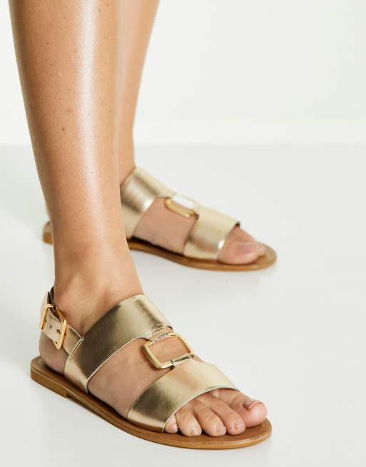 ASOS DESIGN Fenix Sandali bassi in pelle color oro con anello