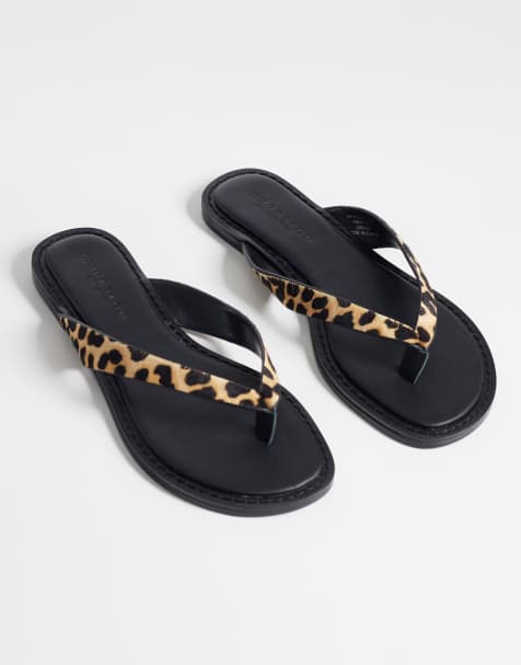 ASOS DESIGN Fenna premium leather flip flops in leopard hair on real leather - view 1