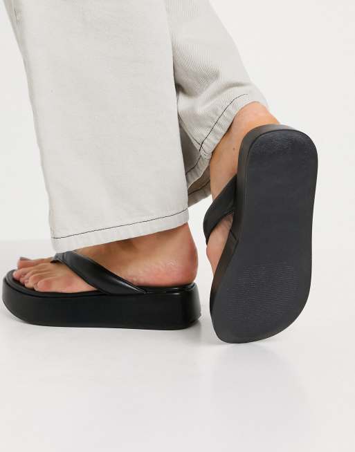 ASOS DESIGN Filter flip flops in black