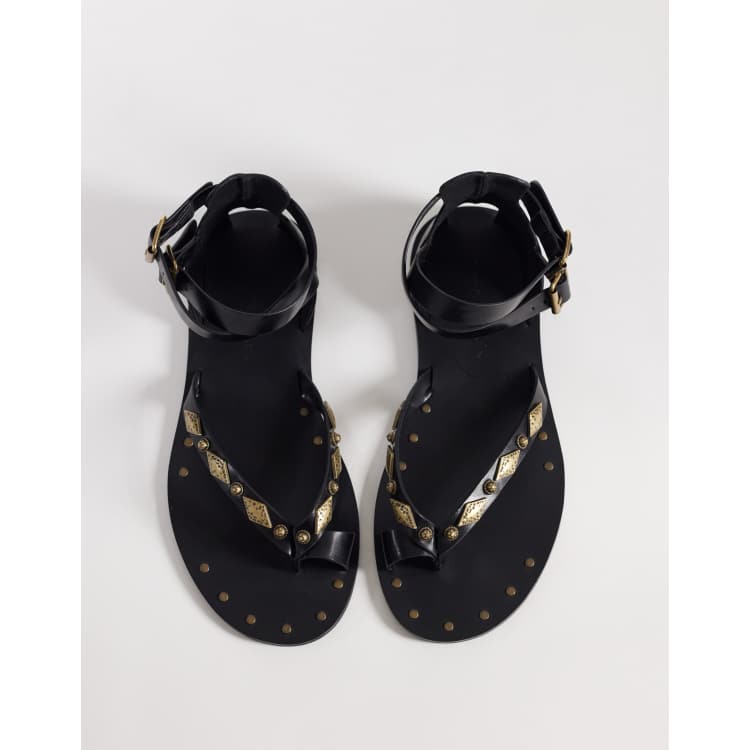 ASOS DESIGN Ferris studded gladiator flat sandals in black 