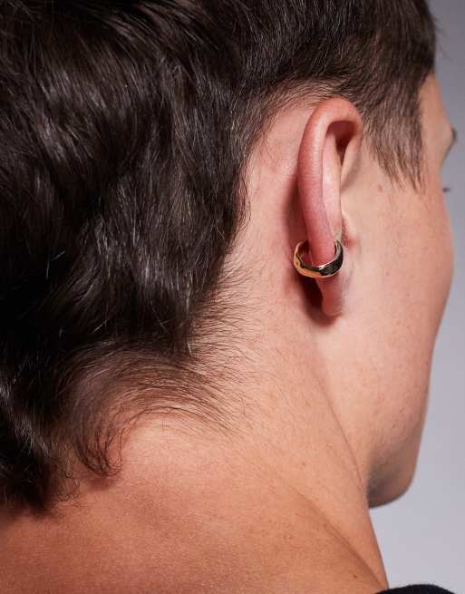 ASOS DESIGN festival chunky molten ear cuff in gold tone 