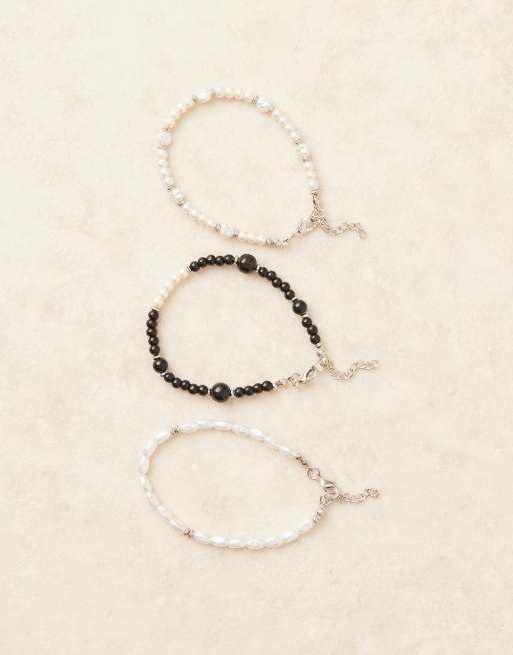 ASOS DESIGN festival faux pearl and beaded 3 pack bracelets in cream 