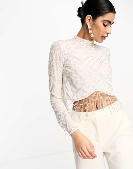 ASOS DESIGN - Festival - Hoogsluitende top met lange mouwen, geruite versiering en zoom met franje in crème 