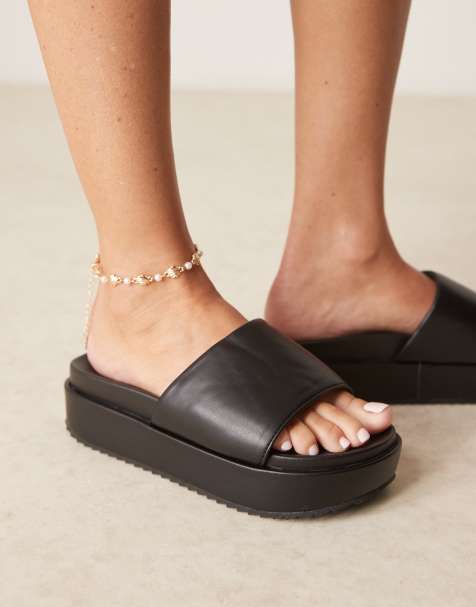 ASOS DESIGN - Festival - Sorte mules med flatform-sål - view 1