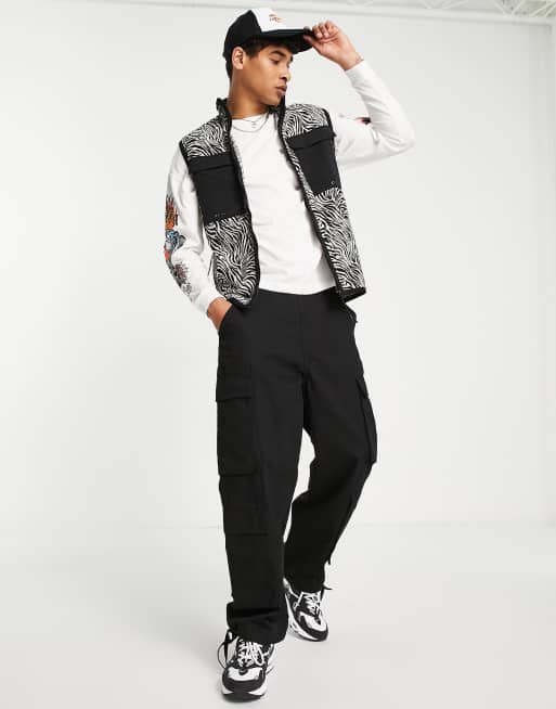 ASOS DESIGN festival vest jacket in all over zebra print with pocket