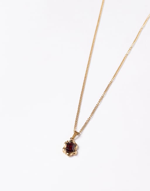 ASOS DESIGN waterproof stainless steel necklace with faux ruby stone pendant in gold tone