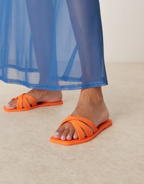 ASOS DESIGN – Fia – Pomarańczowe płaskie klapki gumowe ze skrzyżowanymi paskami - view 1