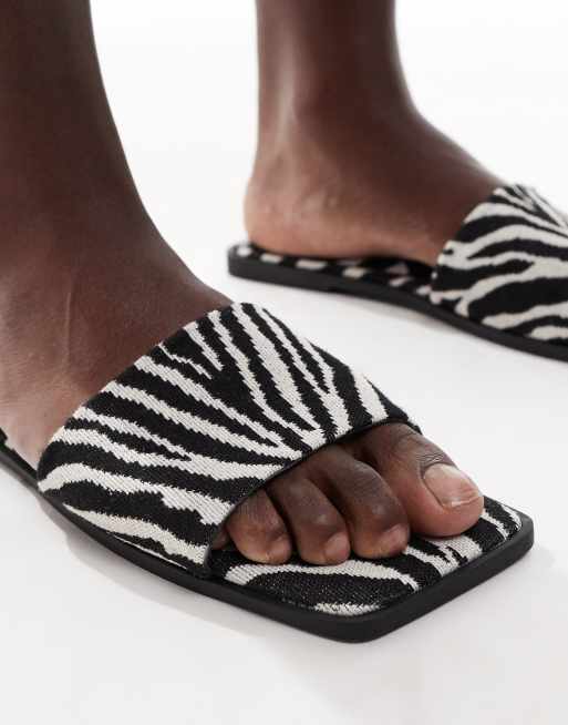 ASOS DESIGN Fig square toe flat mule sandals in zebra, 2 of 4