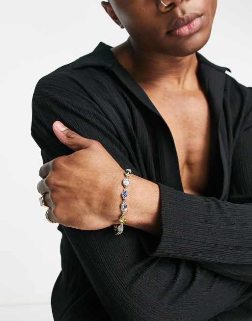 ASOS DESIGN figaro chain bracelet in gold tone with multicolored jewels