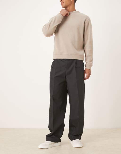 ASOS DESIGN – Figurbetonte Hose aus Funktionsstoff in Schwarz mit weitem Bein und elastischem Taillenbund, 2 von 5