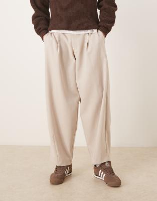 Figurbetonte Hose in Steinbeige mit Wollanteil, weitem, abgerundetem Beinschnitt, sichtbarem Knopfverschluss und Bundfalten-Neutral Neutral 48 Regular