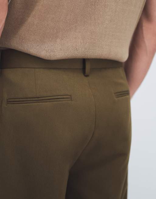 ASOS DESIGN – Figurbetonte, schmal zulaufende Oversize-Hose in Olivgrün mit Bundfalten, 5 von 9