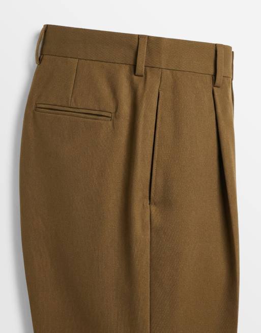 ASOS DESIGN – Figurbetonte, schmal zulaufende Oversize-Hose in Olivgrün mit Bundfalten, 9 von 9