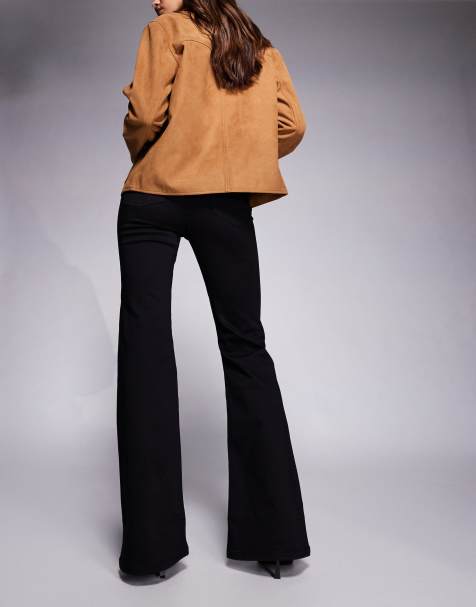 ASOS DESIGN – Figurformende Jeans in Schwarz mit ausgestelltem Bein und Powerstretch - view 1