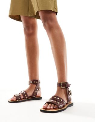 ASOS DESIGN Fiji leather studded flat sandals in burgundy