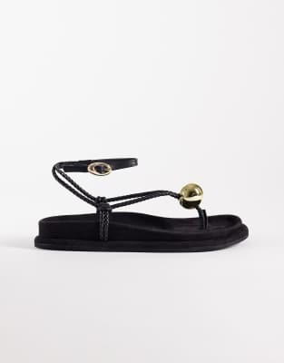 ASOS DESIGN - Filippa - Zehenstegsandalen aus schwarzem Wildlederimitat mit geflochtenem Design und Kugeldetail