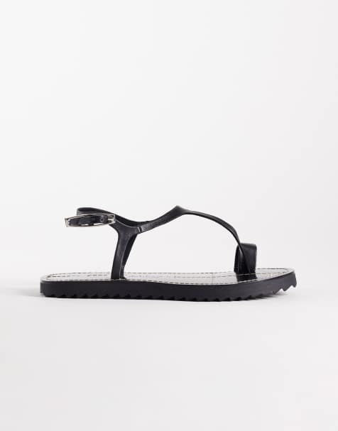 ASOS DESIGN – Filomena – Hochwertige Ledersandalen in Schwarz mit schmaler Zehenschlaufe und Überwendlingsstich - view 1