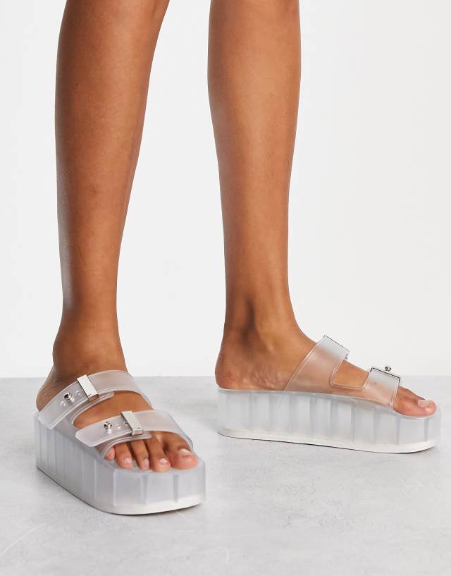 ASOS DESIGN Finale buckle platform flat sandals in clear - CLEAR