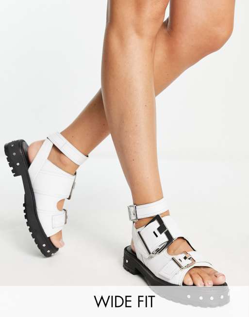 ASOS DESIGN - Finchley - Sandali bassi a pianta larga in pelle premium con suola spessa e fibbie, colore bianco