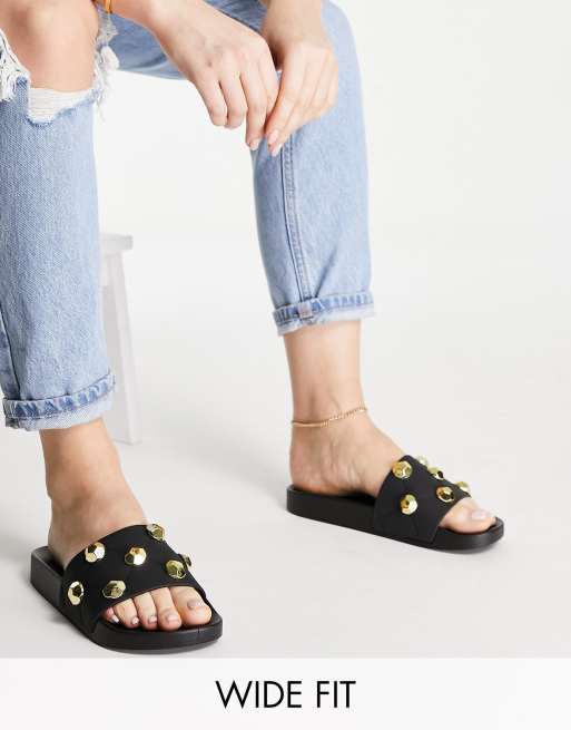 ASOS DESIGN - Finery - Sliders a pianta larga nere trapuntate con borchie