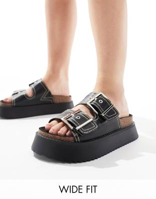 ASOS DESIGN - Firecracker - Flache Sandalen in Schwarz mit zwei Riemen und Fußbett, weite Passform