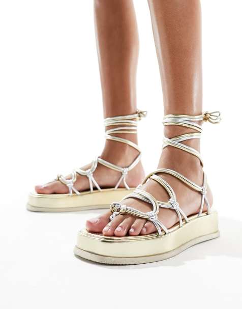 ASOS DESIGN Firework strappy flat sandals in gold metallic mix - view 1