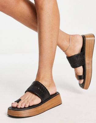 Shop Asos Design First Hand Premium Leather Toe Loop Flat Mules In Black