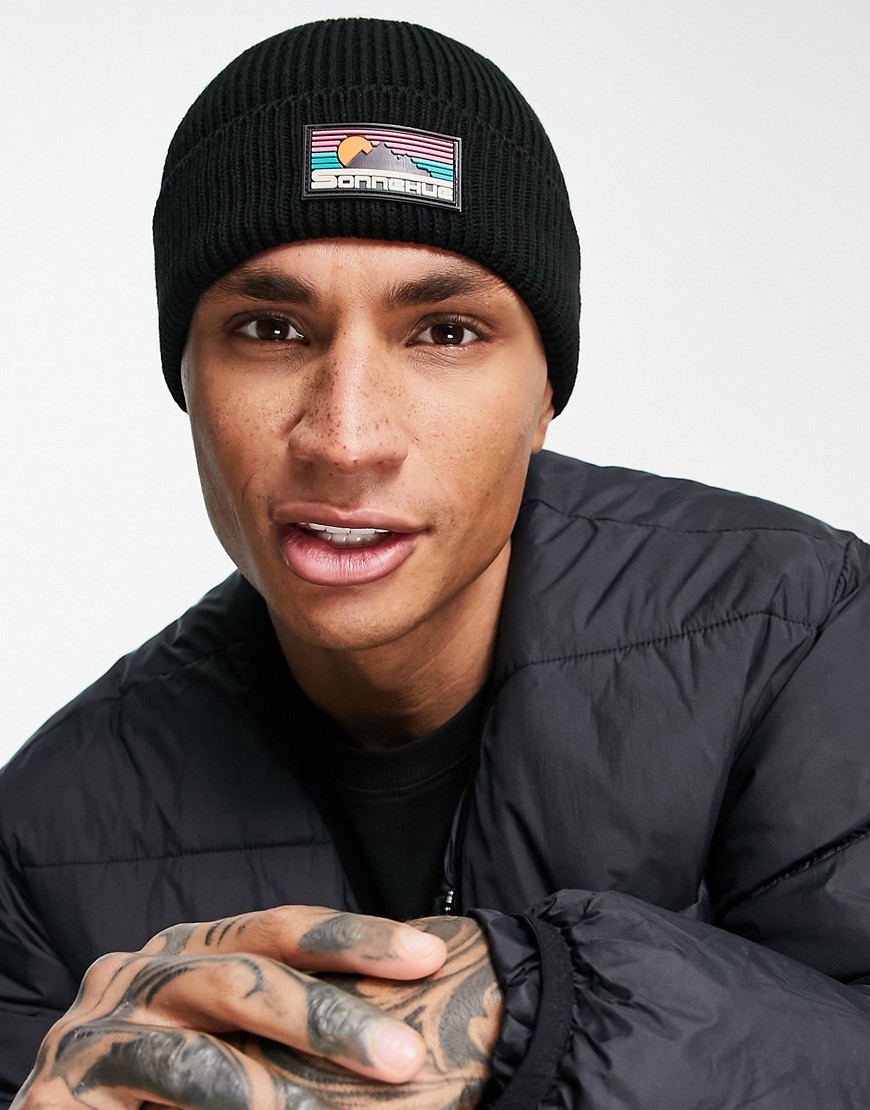 ASOS DESIGN fisherman ribbed beanie with rubber logo in black