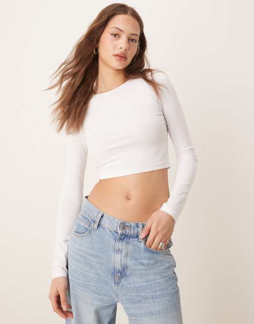 ASOS DESIGN turtle neck long sleeve rib crop top in white