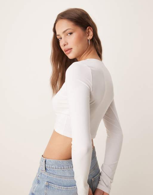 ASOS DESIGN fitted crop top with popper front in white