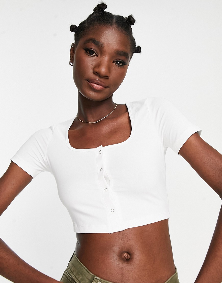 ASOS DESIGN fitted crop top with popper front in white