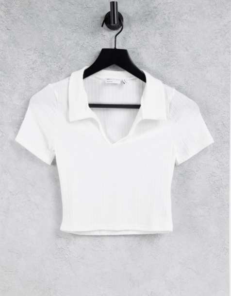 ASOS DESIGN fitted polo top in rib with short sleeve in white - view 1