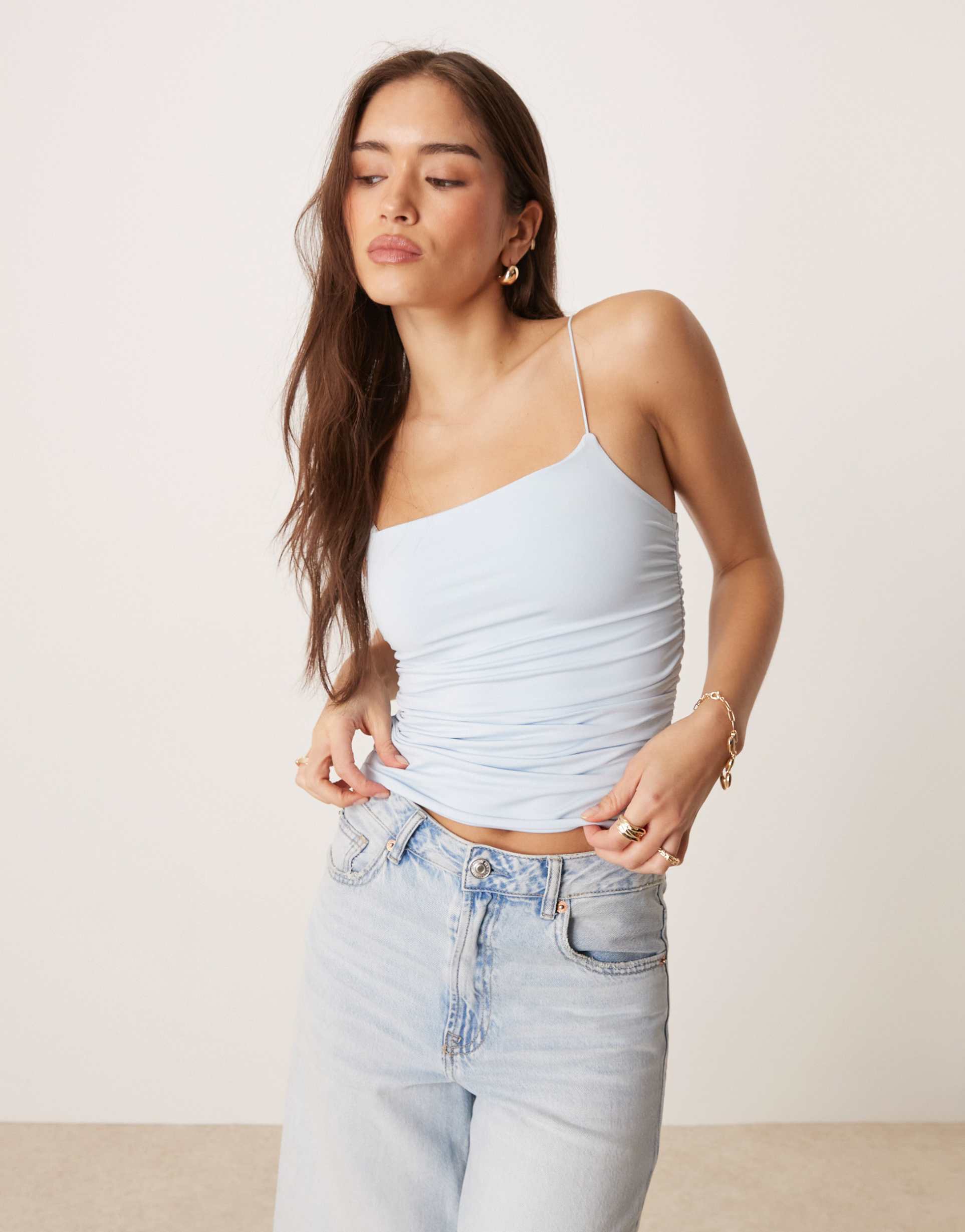 asos design fitted ruched side cami top with spaghetti straps in slinky in light blue
