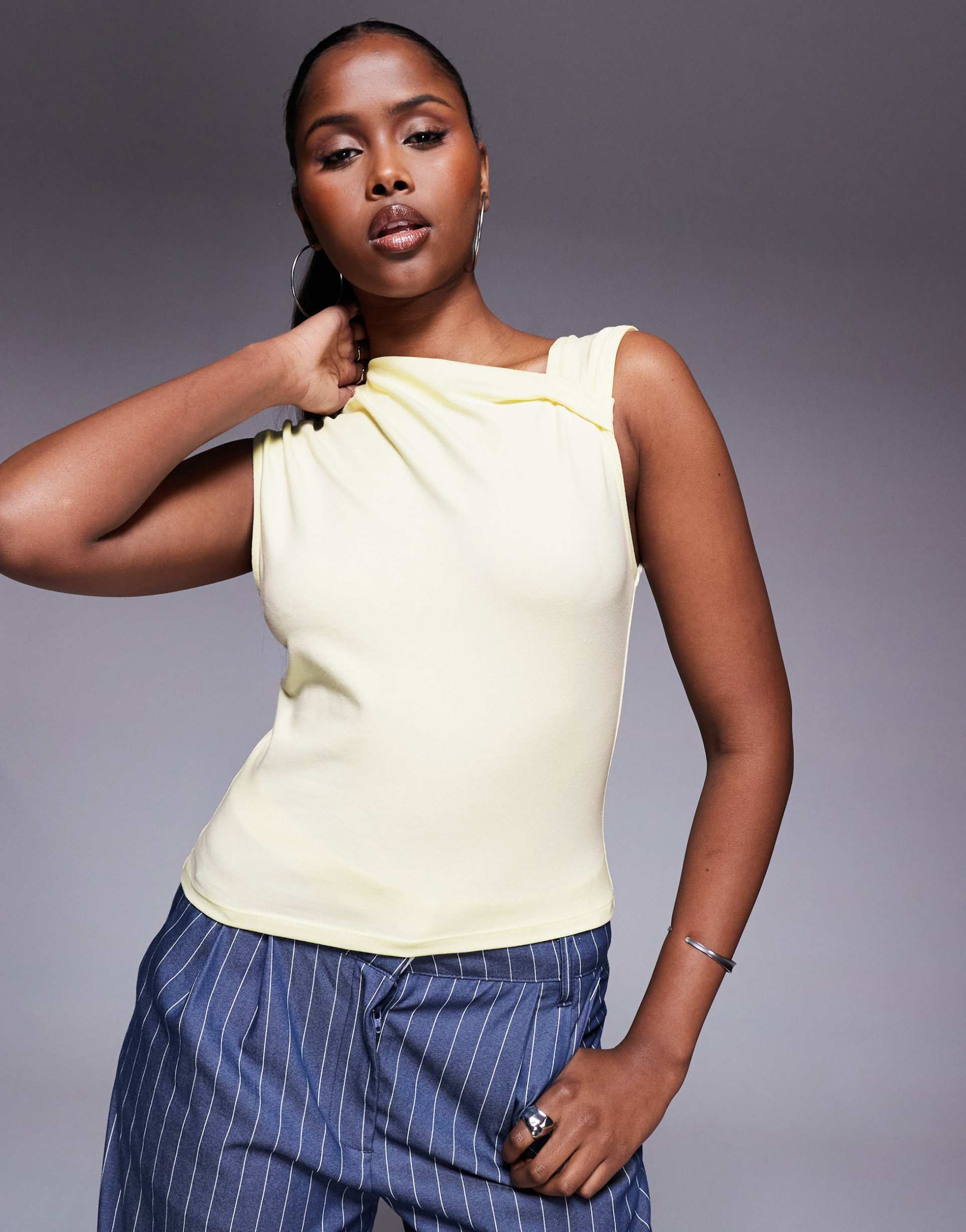 asos design fitted twist neck detail top in pastel yellow