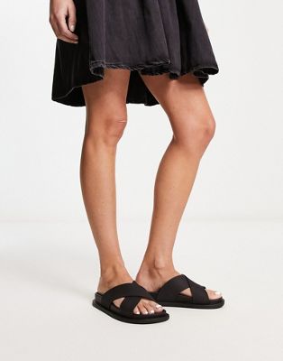 ASOS DESIGN Fixation cross strap jelly flat sandals in black