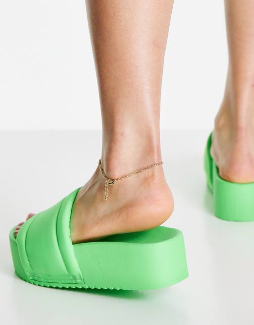 ASOS DESIGN Fizzy flatform padded sliders in green