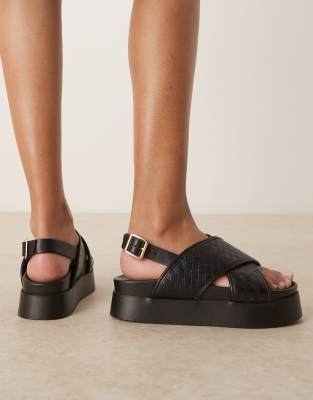 ASOS DESIGN - Flame - Sandalen in Schwarz mit gewebten überkreuzten Riemen und Fußbett