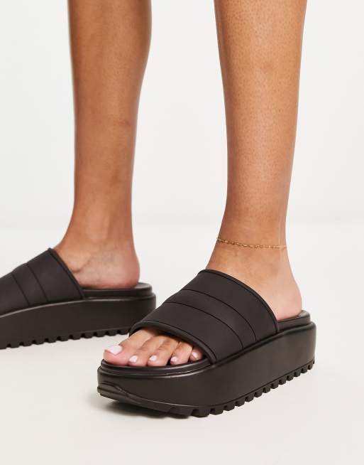 ASOS DESIGN Wide Fit Flare quilted sliders in black