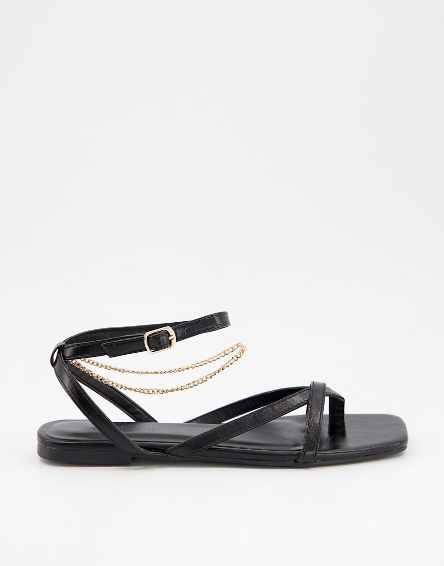 ASOS DESIGN Flames flat sandals with ankle chain in black