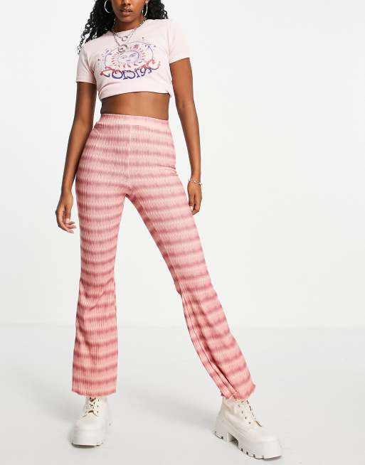 ASOS DESIGN - Flare broek met ombre-textuur in roze en geel